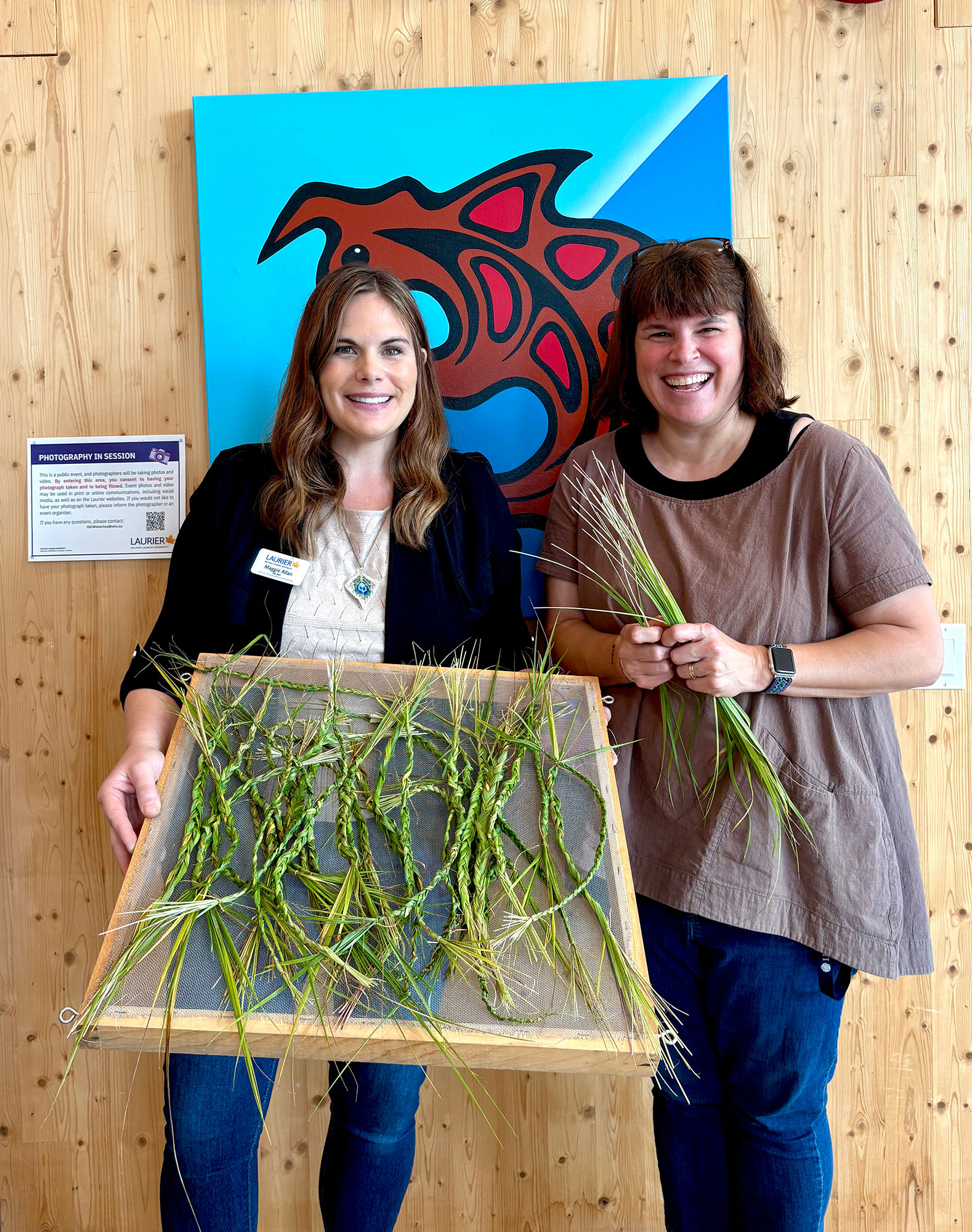 staff hold up braided sweetgrass