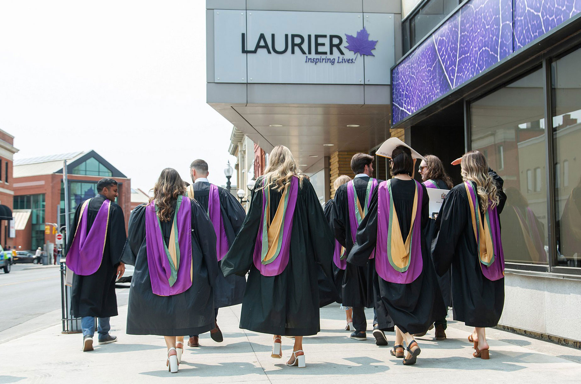 education graduates walk downtown Brantford