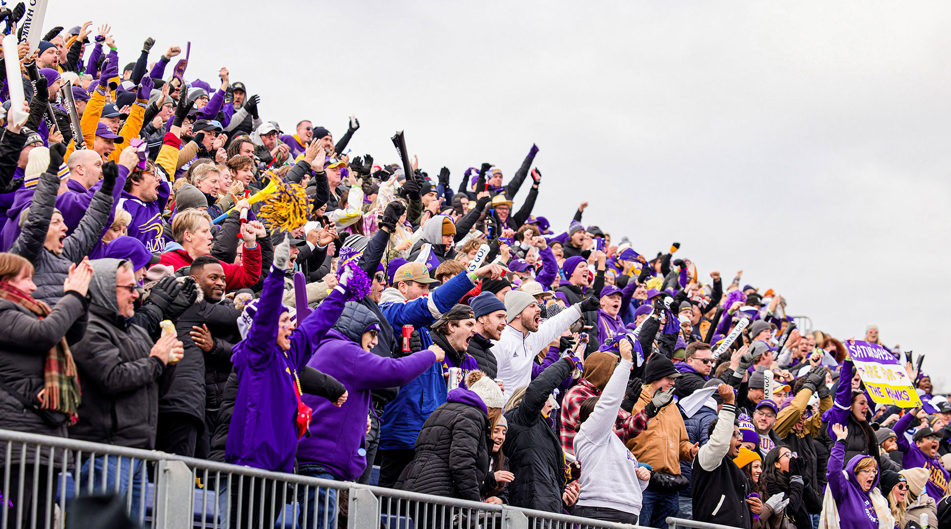 fans cheer at a Golden Hawks game
