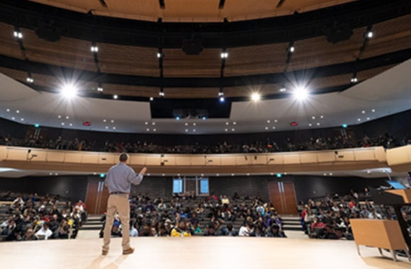 Guest lecturer in Lazaridis Hall auditorium.