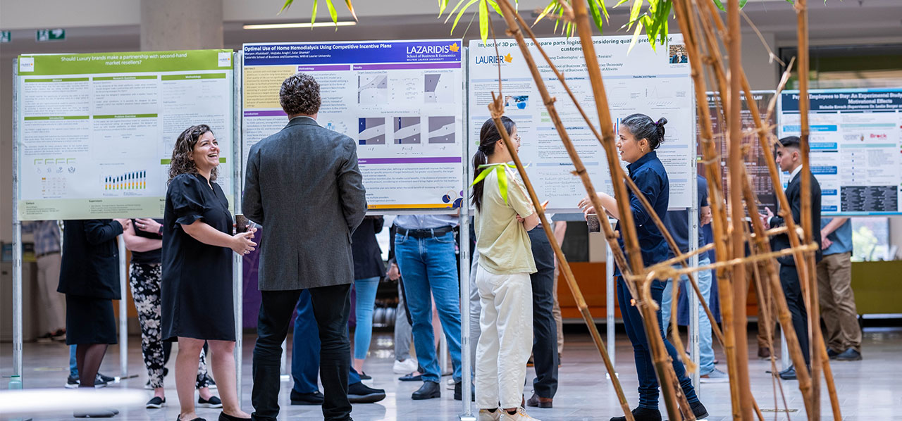 Student research posters in Lazaridis Hall atrium.