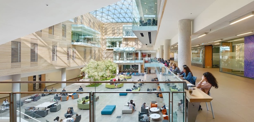 Lazaridis Hall atrium full of students studying at tables