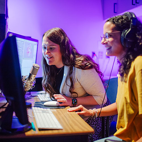 Scheerer speaks into microphone