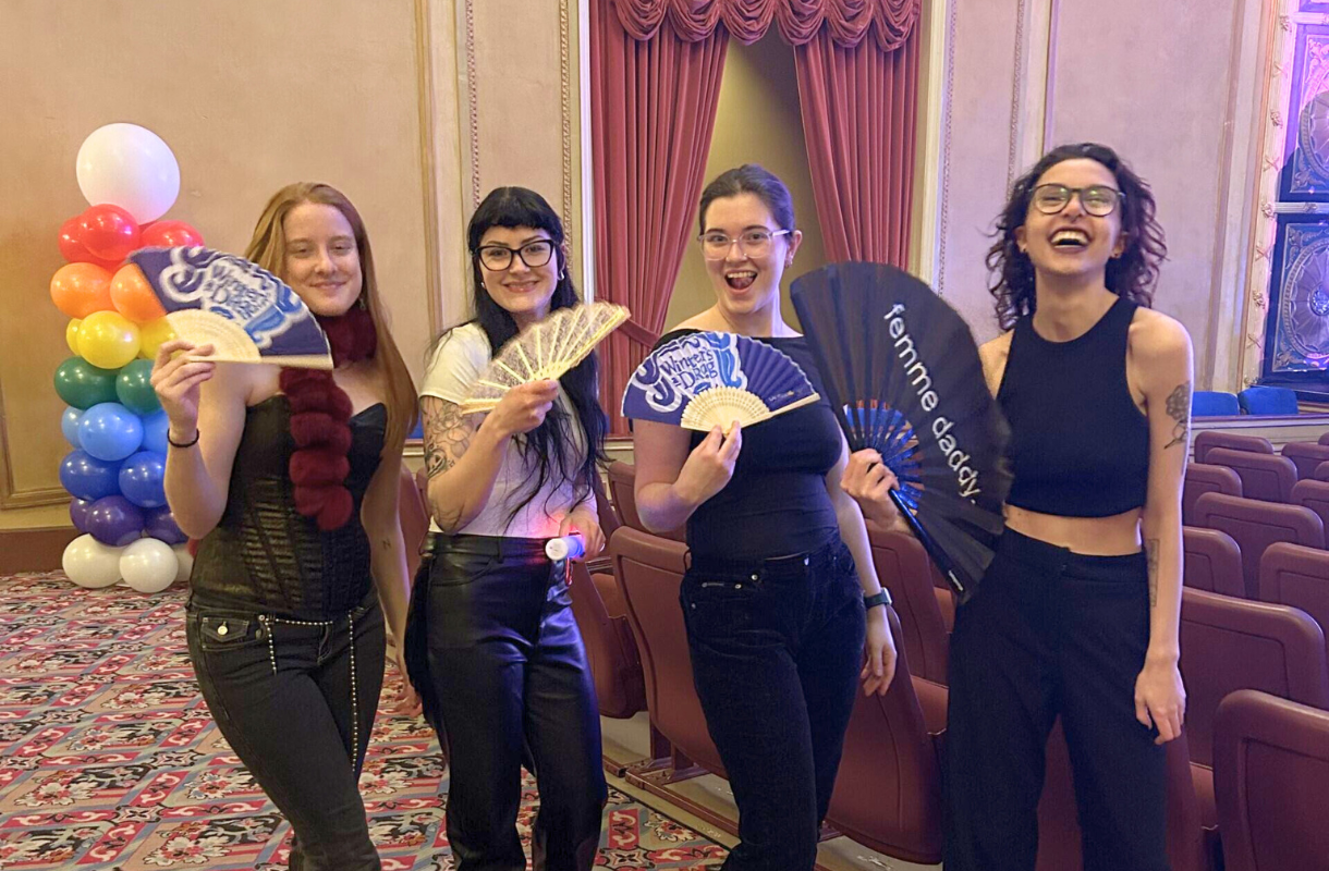 Students posing at Winter's a Drag event