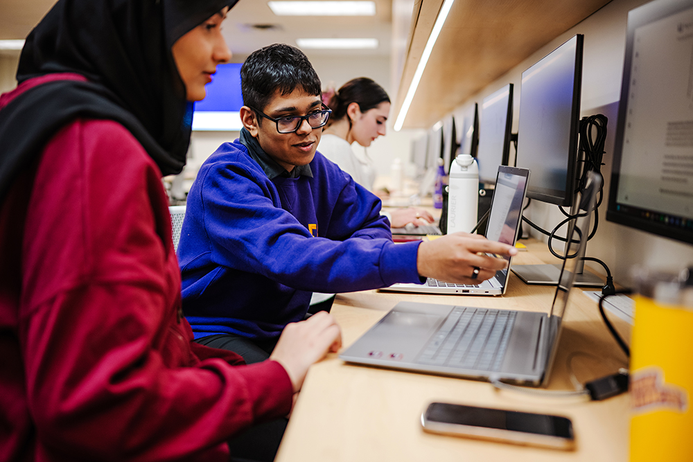 Students at laptop computer